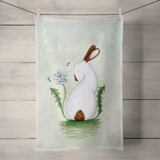 Premium 100% Panama cotton tea towel featuring the whimsical And Every Wish is For You rabbit artwork against a soft sage green background
