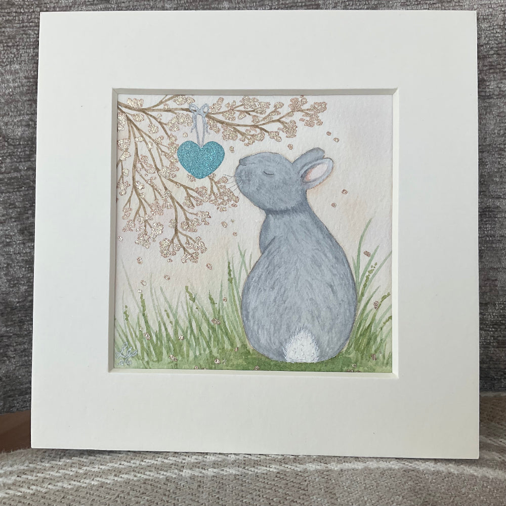 Original bunny watercolour painting titled Whisper of the Blue Heart, size 4 by 4 inches